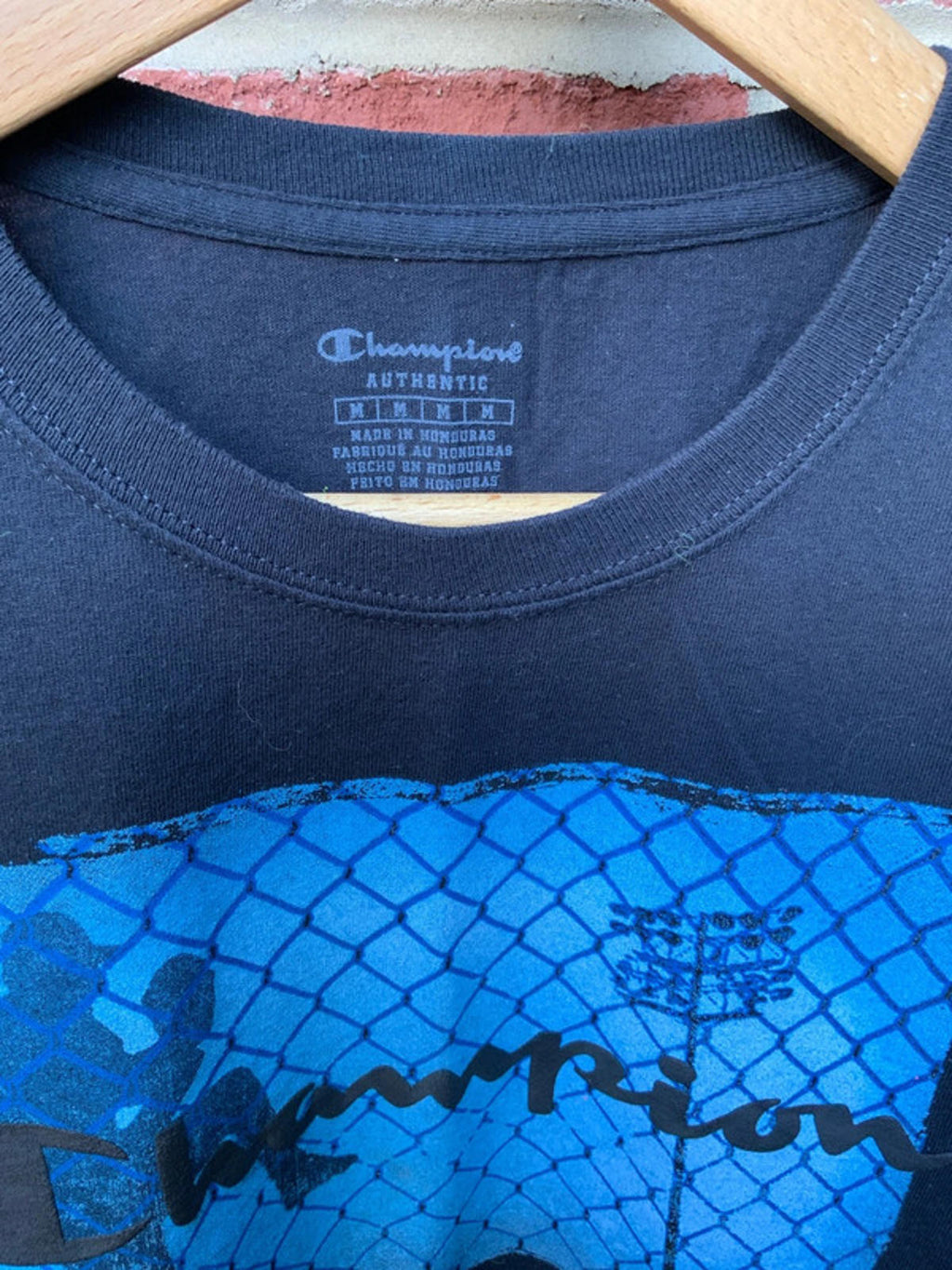 Champion pitcher tee medium