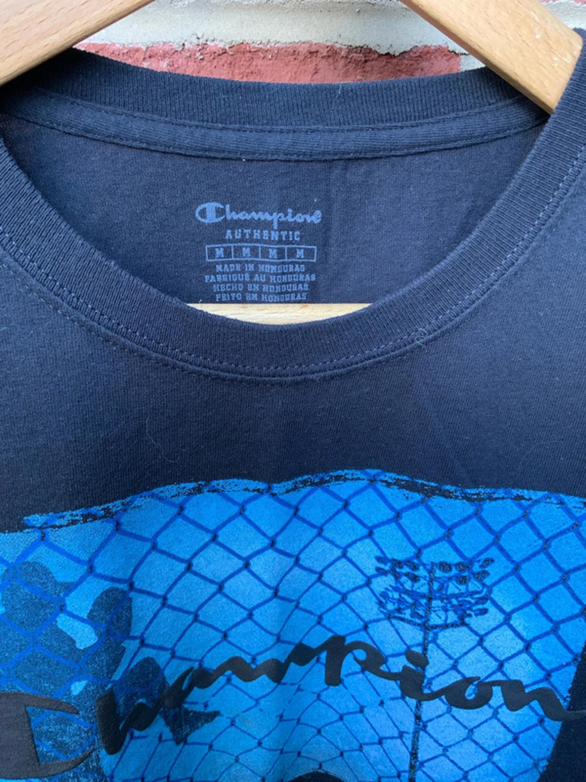 Champion pitcher tee medium