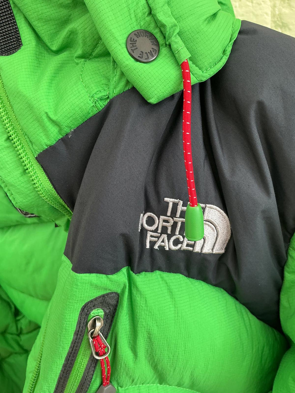 The North Womens Large Face Green and Black Hooded Puffer Jacket