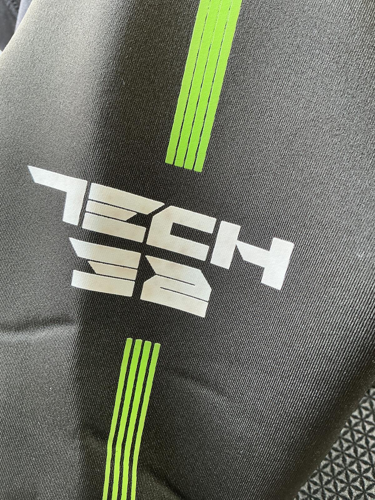 Tiki Black and Green Wetsuit Size J14 for Water Sports and Diving