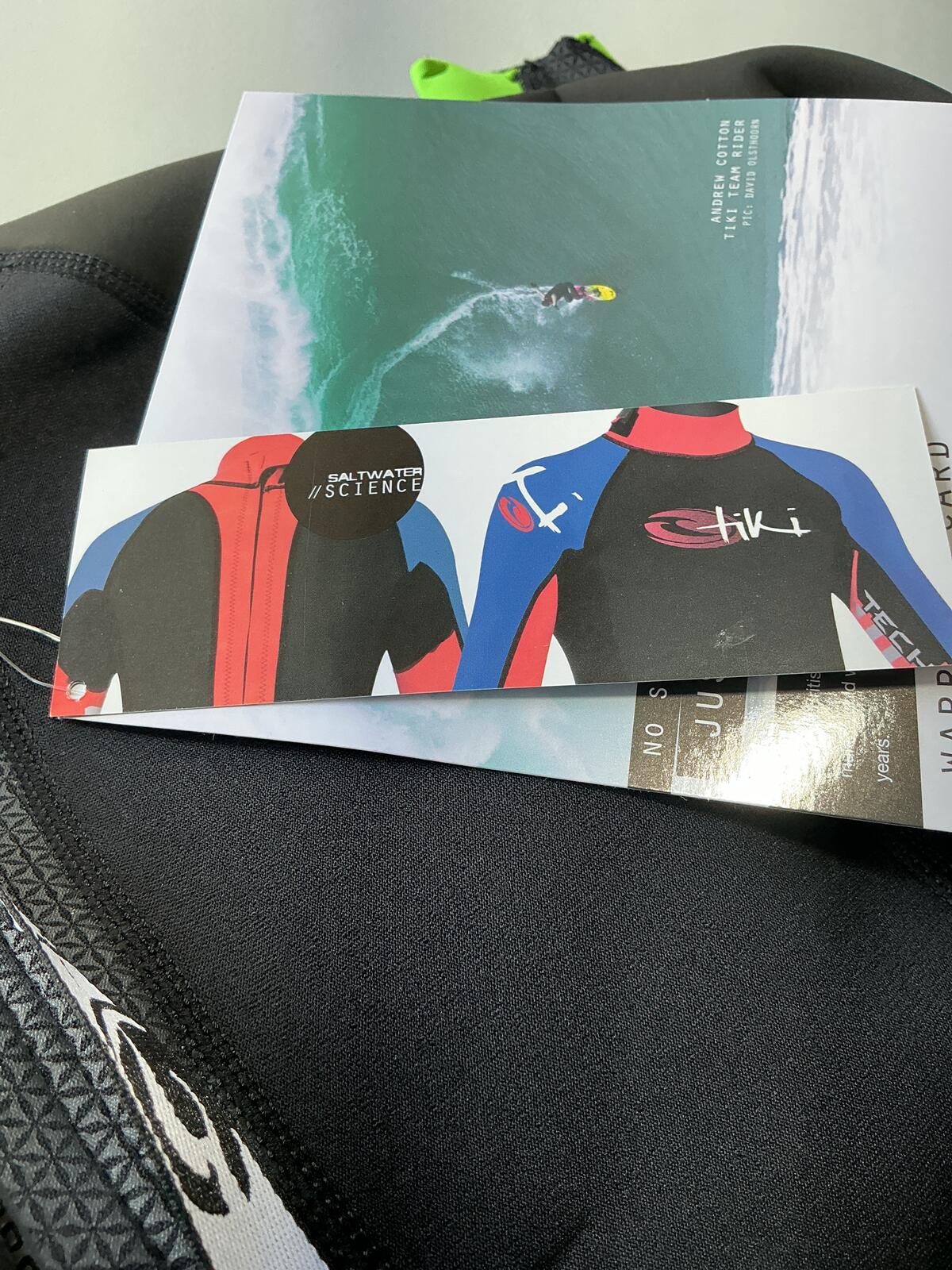 Tiki Black and Green Wetsuit Size J14 for Water Sports and Diving